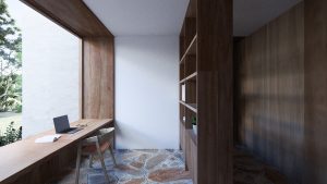 Study looking out to the garden with cobbled stone flooring and timber bench and shelving — sustainable new home — Eltham — Moloney Architects