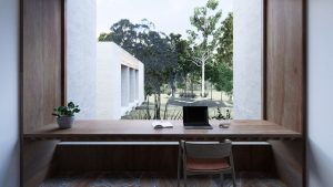 Study with cobbled stone flooring and timber bench and shelving looking out through window to garden — sustainable new home — Eltham — Moloney Architects